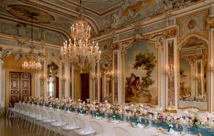 the ballroom at aman venice dressed up for a luxury wedding reception