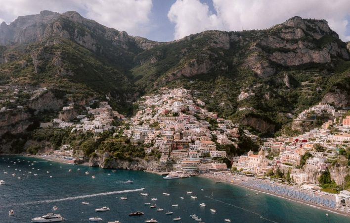 view of Positano with colorful houses from the drone