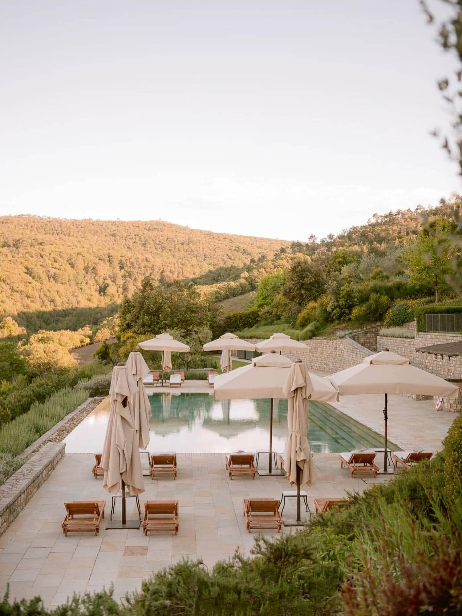 the pool area on the grounds of Rosewood Castiglion del Bosco